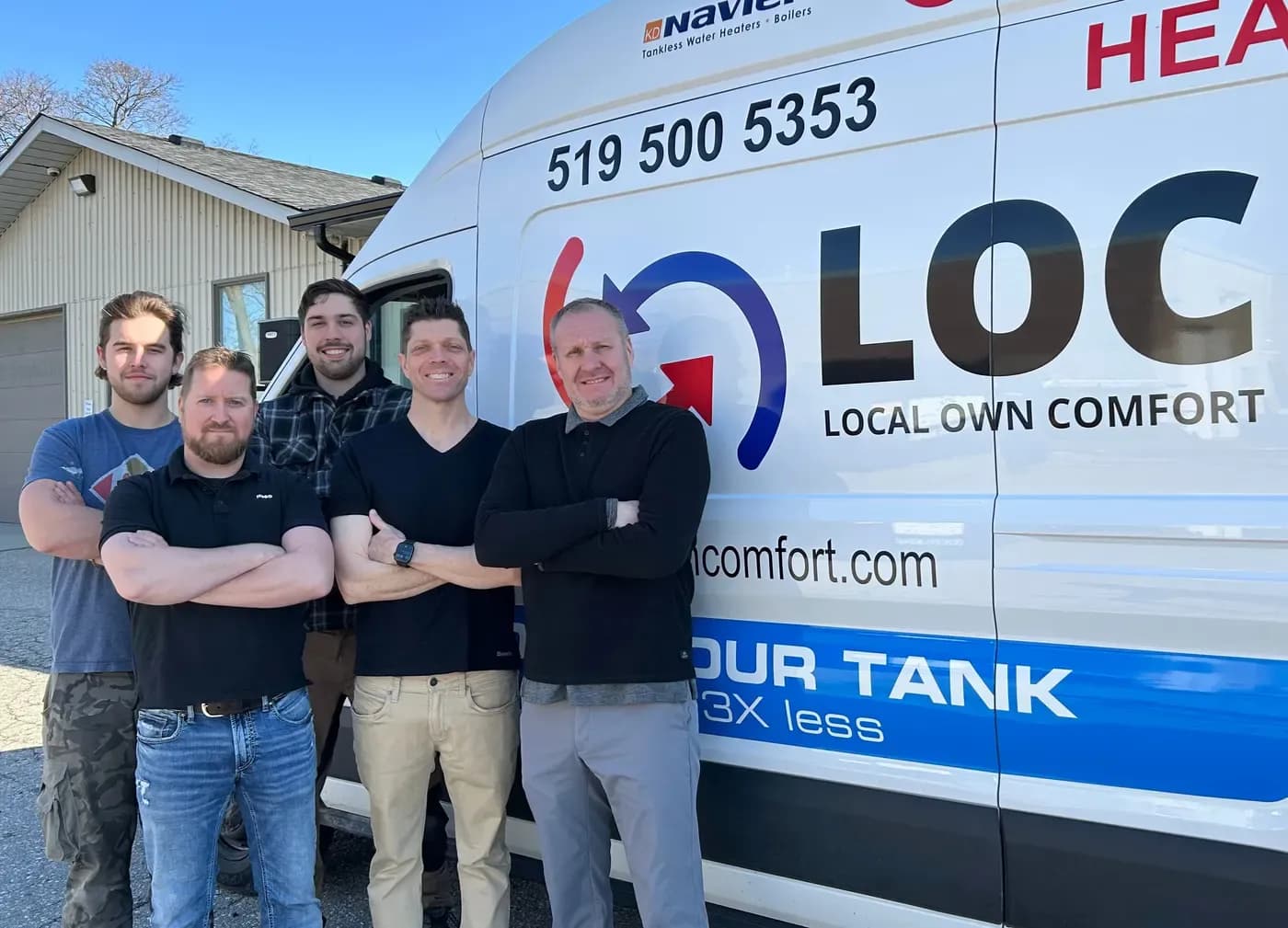 The Local Own Comfort team in front of the shop and LOC service van